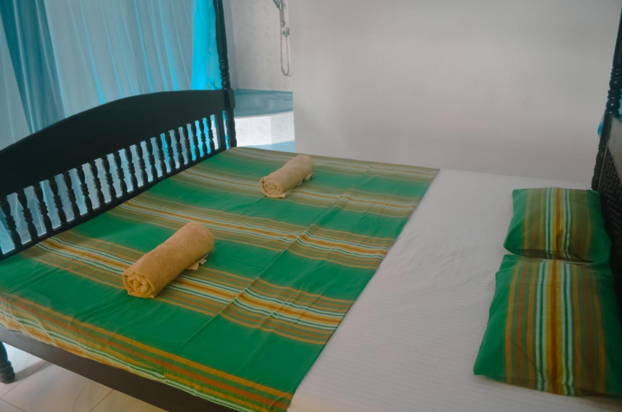 Glow Accommadation Тангале Екстериор снимка
