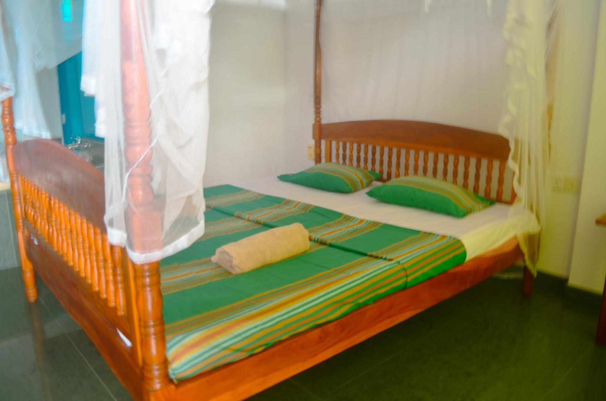 Glow Accommadation Тангале Екстериор снимка